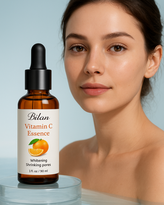 Bilan Vitamin C Essence bottle with a woman's face on a light blue background
