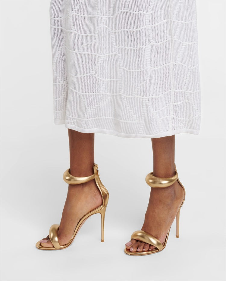 A single strap high heel thin heel sandal